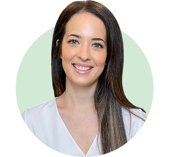 Maddison Franse, certified audiologist, professional headshot with white top and pale green background