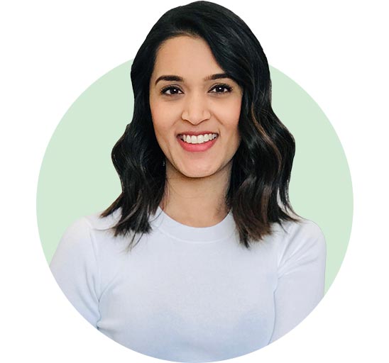 Nimi Daya Naran wearing a white top against a light green background