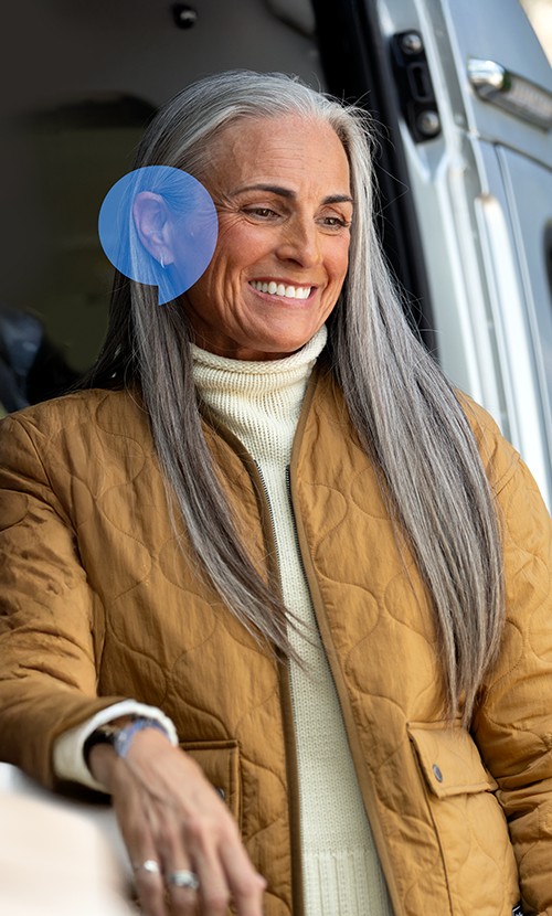 Woman smiling looking down