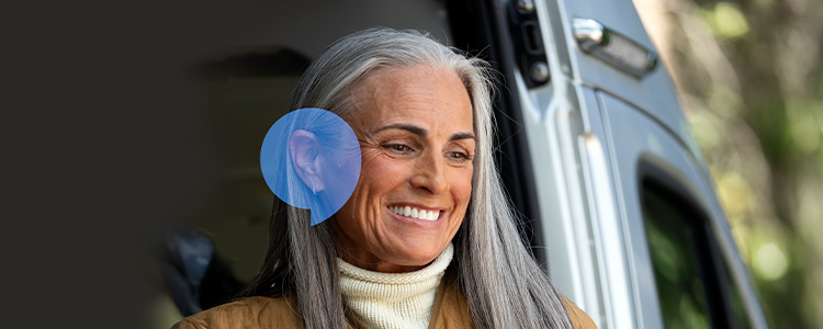 Woman smiling looking down