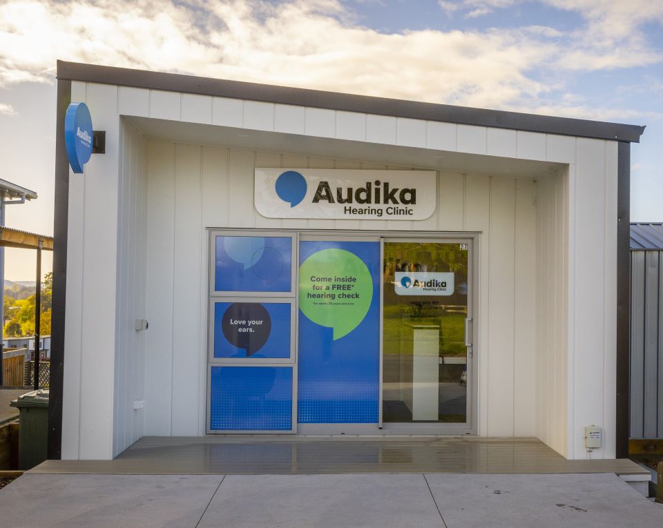 Audika Hearing Clinic in Cambridge, offering free hearing checks with the slogan ’Love your ears.’