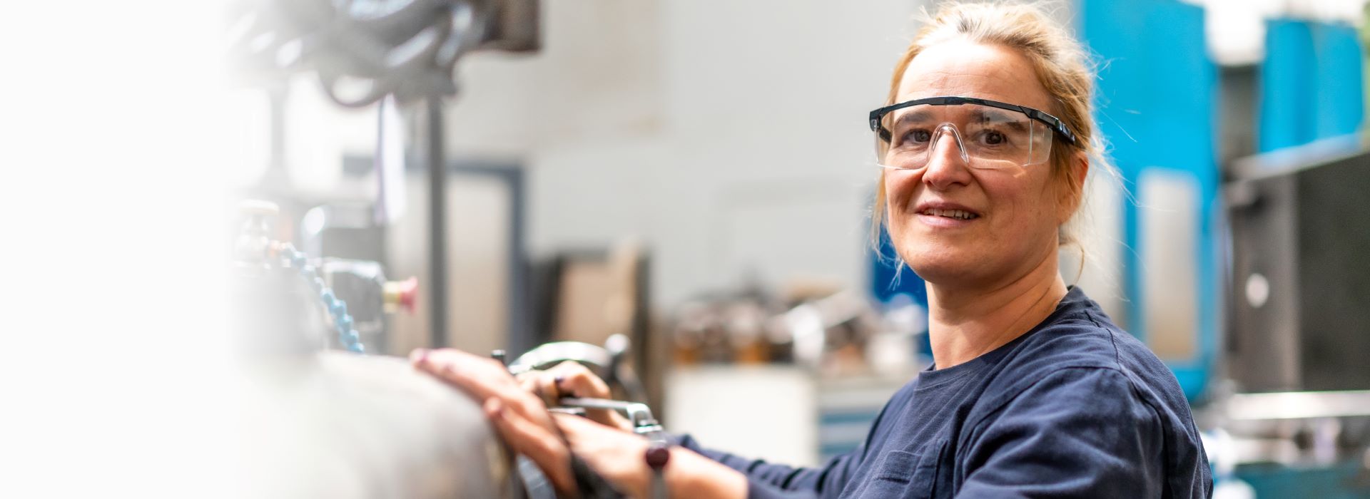 Full_width_image_of_female_factory_worker