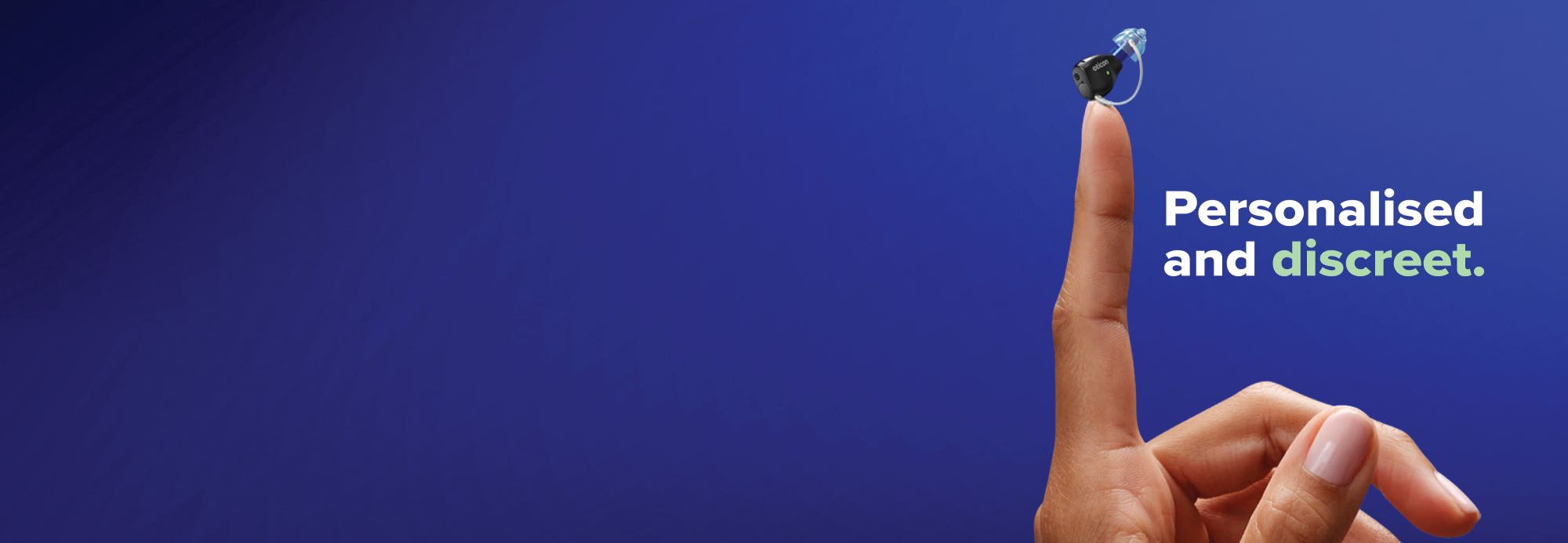 Blue_background_index_finger_pointing_up_with_hearing_aid balanced_on_top_of_finger_message_is_personalised_and_discreet