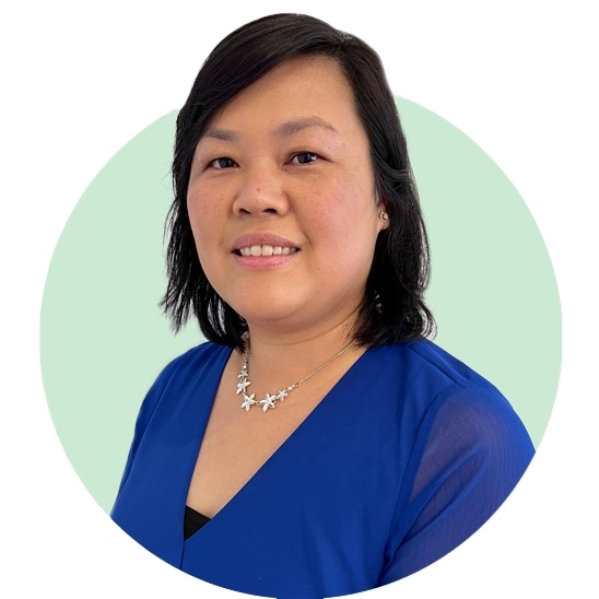 Author bio portrait featuring a person in a blue top with a silver star necklace, set against a pale green circular background.