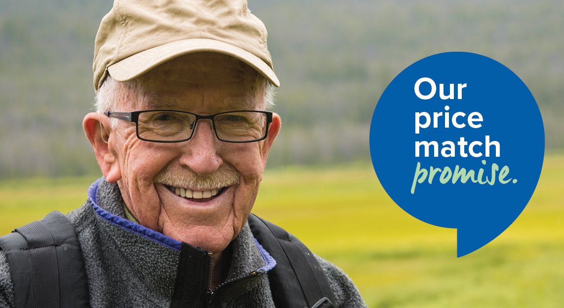 Elder_man_wearing_cap_smiling_outdoors