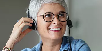 Image shows woman during hearing test