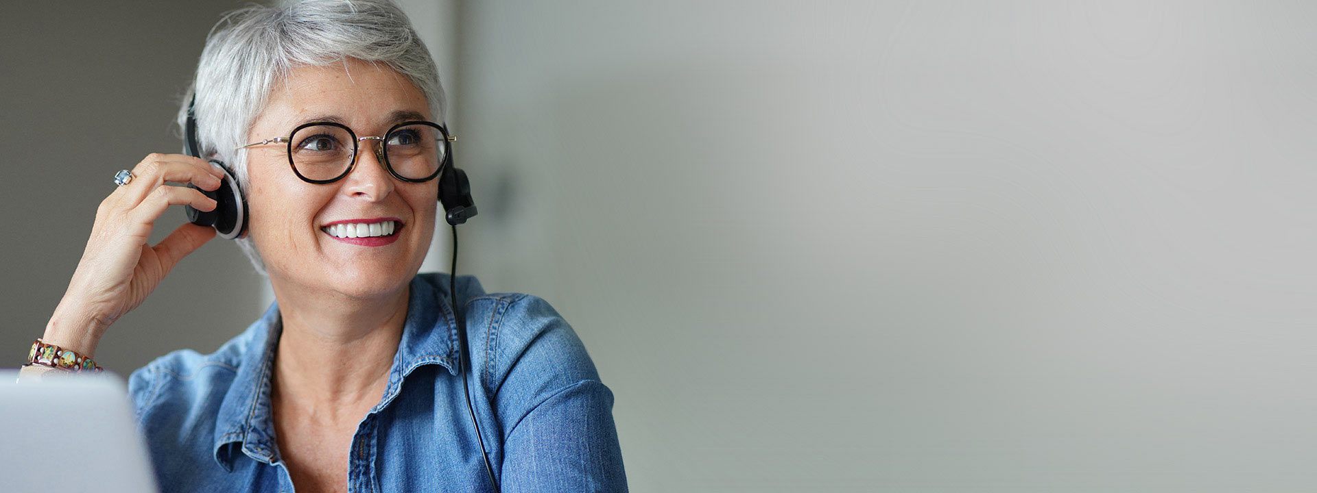 Woman undergoing a hearing test while wearing headphones