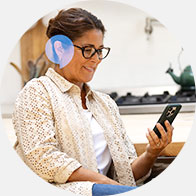 Image shows man talking on the phone
