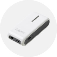 The Oticon EduMic is a compact, rectangular wireless microphone device with a white outer casing and gray sides, designed to enhance hearing aid performance in educational or noisy environments.