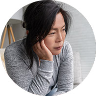 Image shows woman being sad