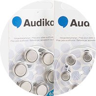 Audika hearing aid battery packs with visible batteries